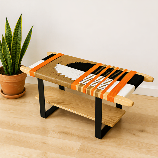 a wooden bench with a woven seat and a potted plant on the floor next to it.