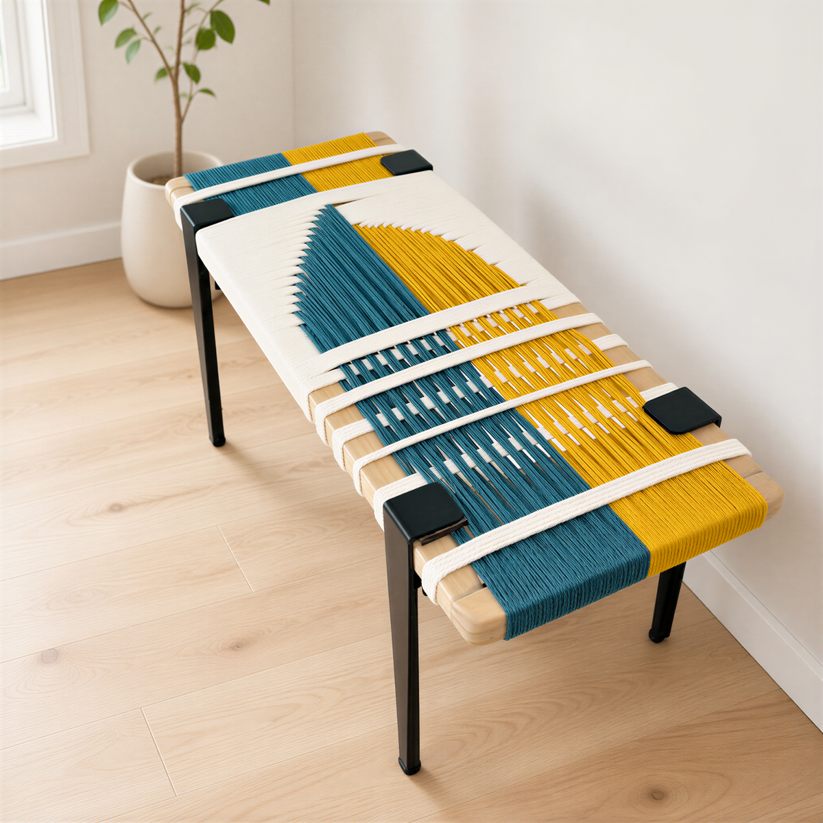 a modern, colorful bench with a woven design on the seat and legs. The bench is placed on a wooden floor, and there is a plant in the background.