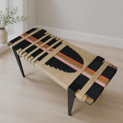 a modern, woven bench with a black and orange color scheme, placed on a wooden floor in a room with a window.